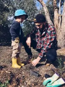 Father and son planting a tree